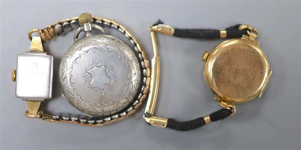 An early 20th century 9ct gold manual wind wrist watch, gross 23.9 grams, one other watch and a silver fob watch.